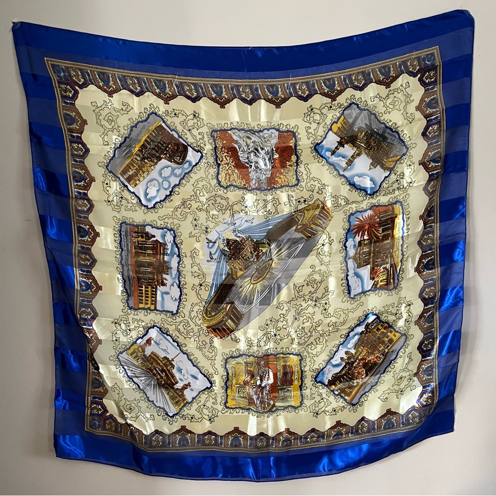 2/25$ 🪽 Elegant Blue and Cream Scarf with Scenic Prints